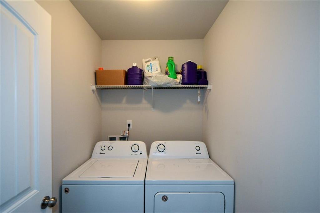 917 Revere Way Hampton, GA 30228 - Photo 22 of 25 a utility room with dryer and washer