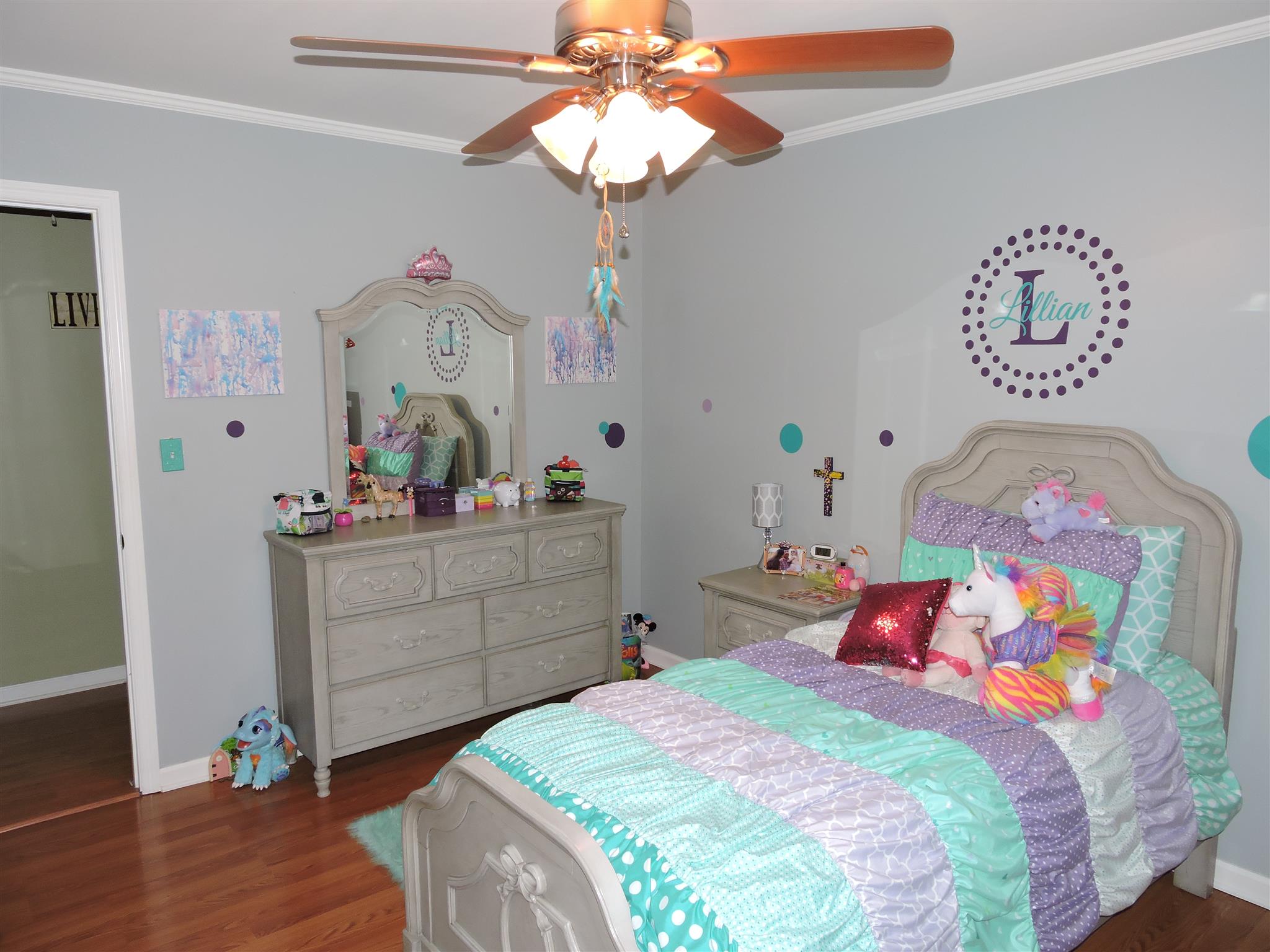 9136 Shelbyville Road Morrison, TN 37357 - Photo 14 of 21 a bedroom with a bed and wooden floor