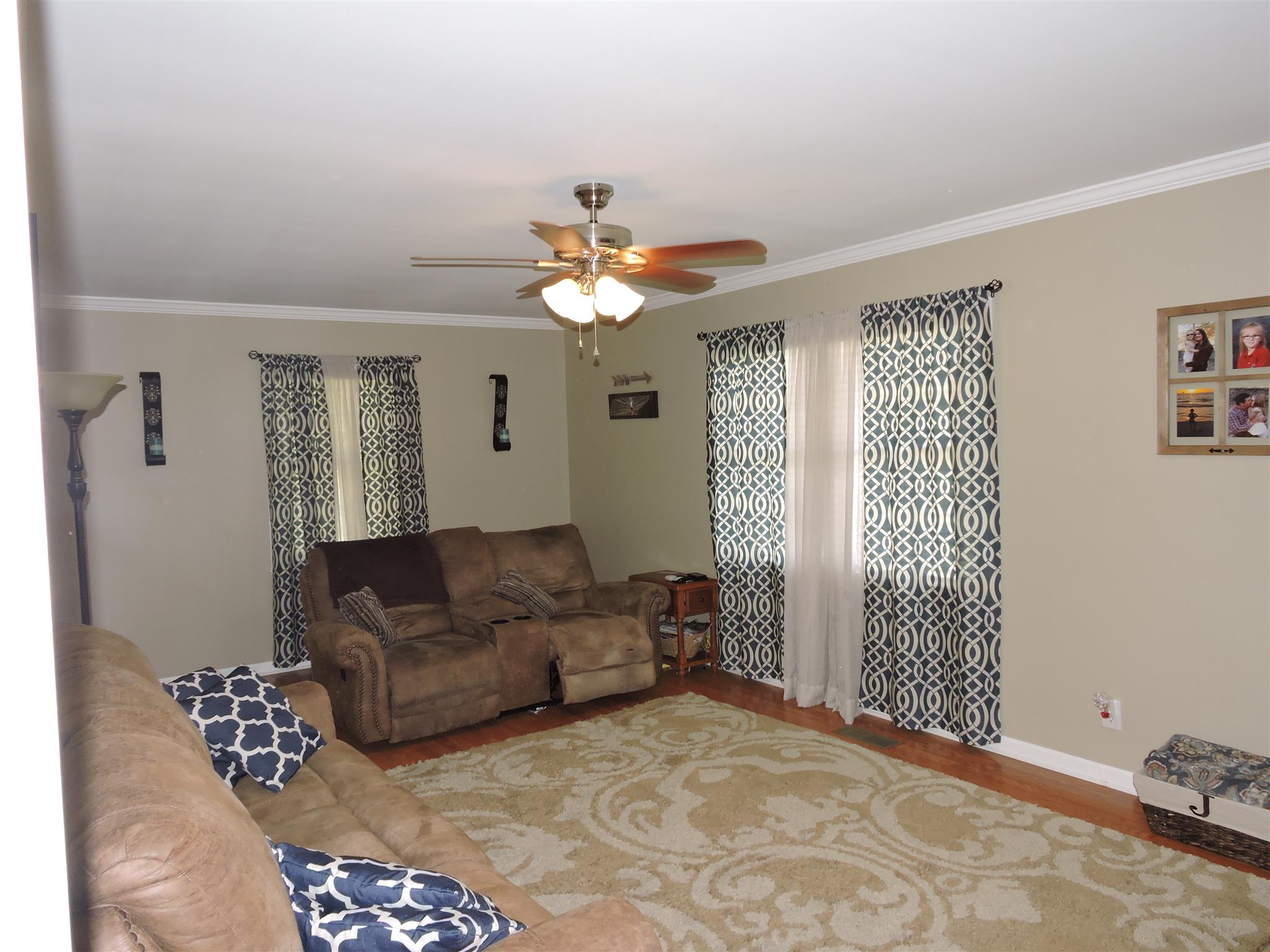 9136 Shelbyville Road Morrison, TN 37357 - Photo 3 of 21 a living room with furniture flowerpot and a chandelier