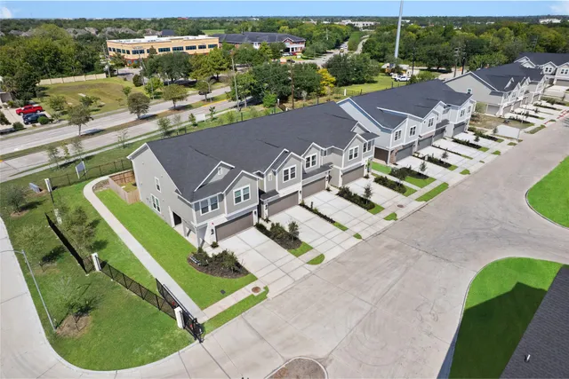 an aerial view of a house with a garden
