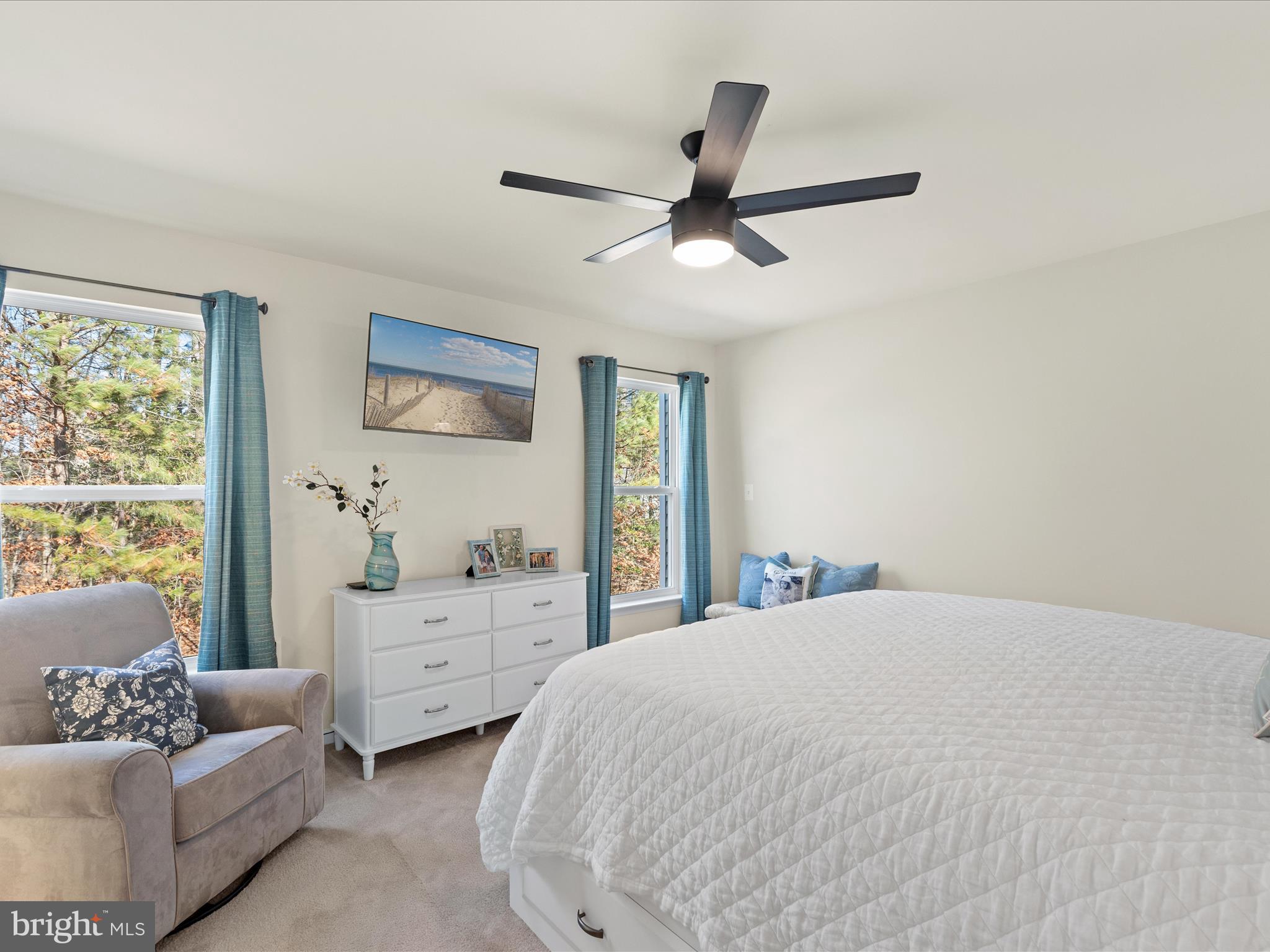 165 Intrepid Lane Berlin, MD 21811 - Photo 17 of 46 a spacious bedroom with a bed and windows