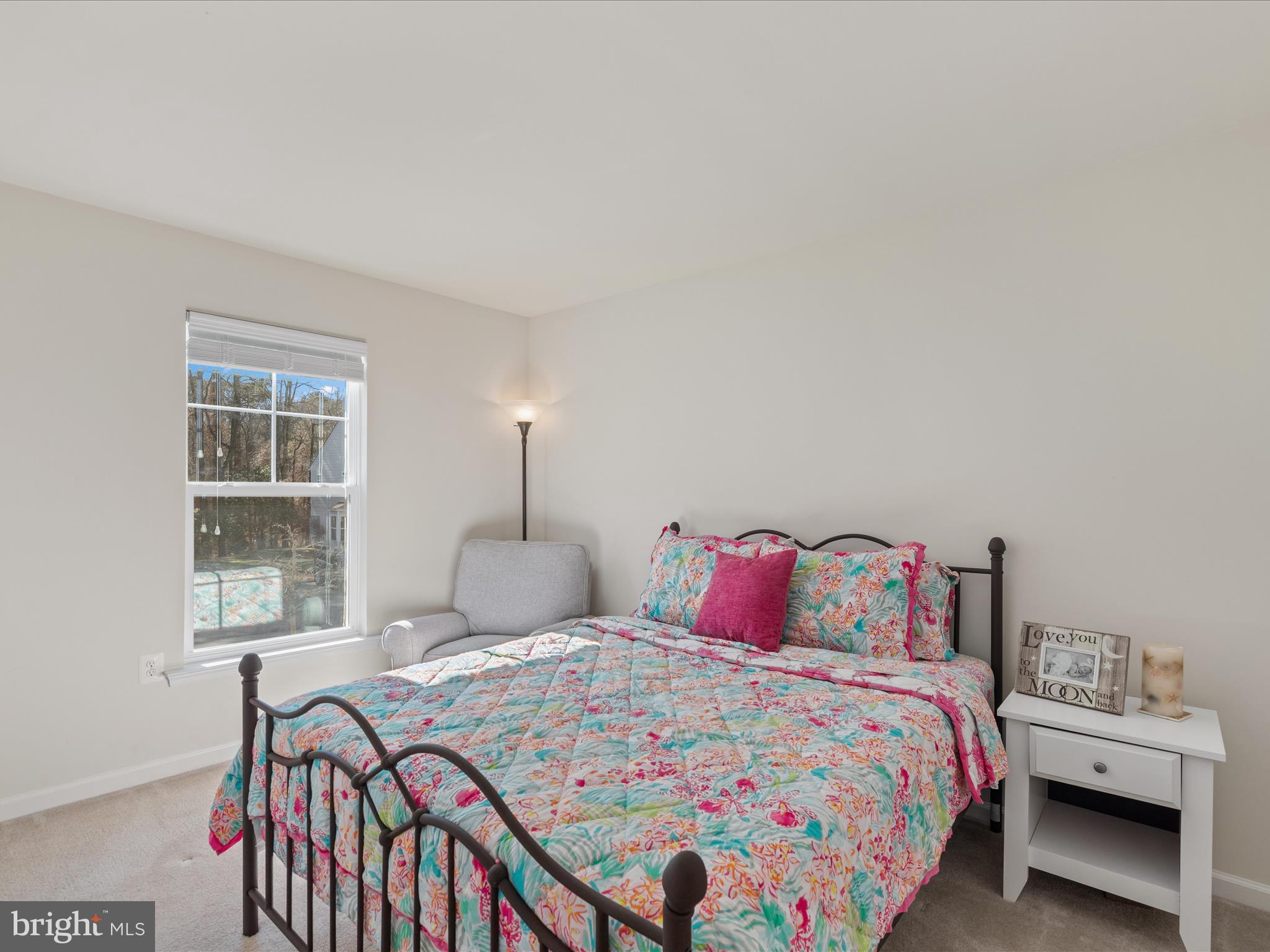 165 Intrepid Lane Berlin, MD 21811 - Photo 23 of 46 a bedroom with a bed and a window