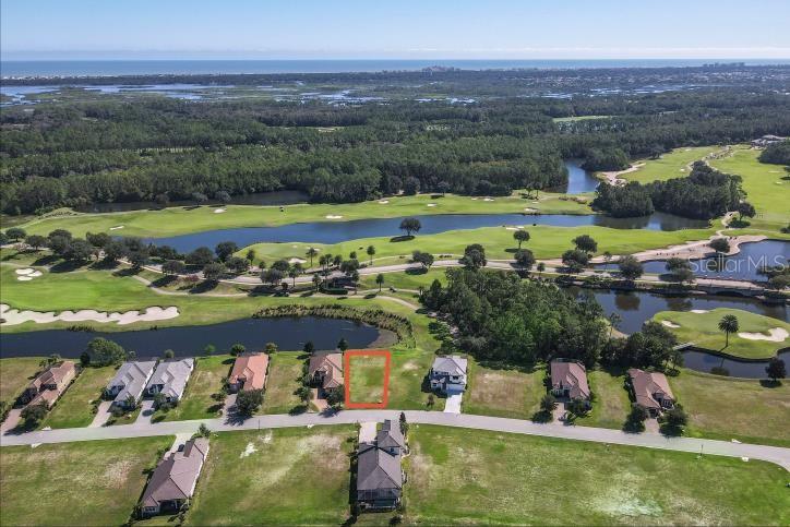 339 Hibiscus Way Palm Coast, FL 32137 - Photo 2 of 16 a view of a swimming pool and lake view
