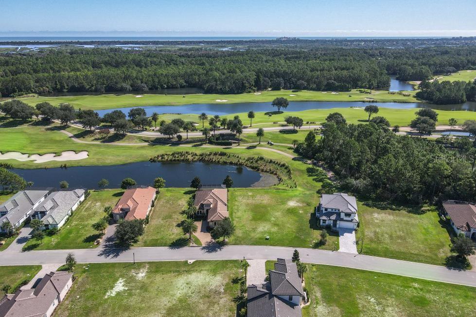 339 Hibiscus Way Palm Coast, FL 32137 - Photo 3 of 16 an aerial view of a house with a garden