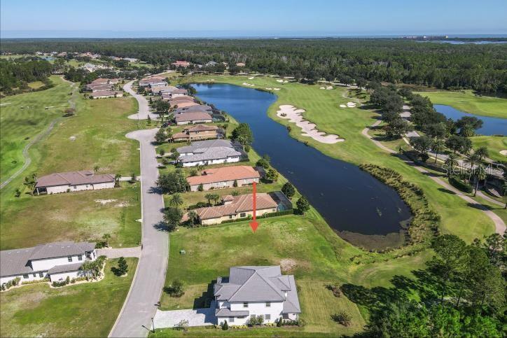 339 Hibiscus Way Palm Coast, FL 32137 - Photo 4 of 16 an aerial view of residential houses with outdoor space