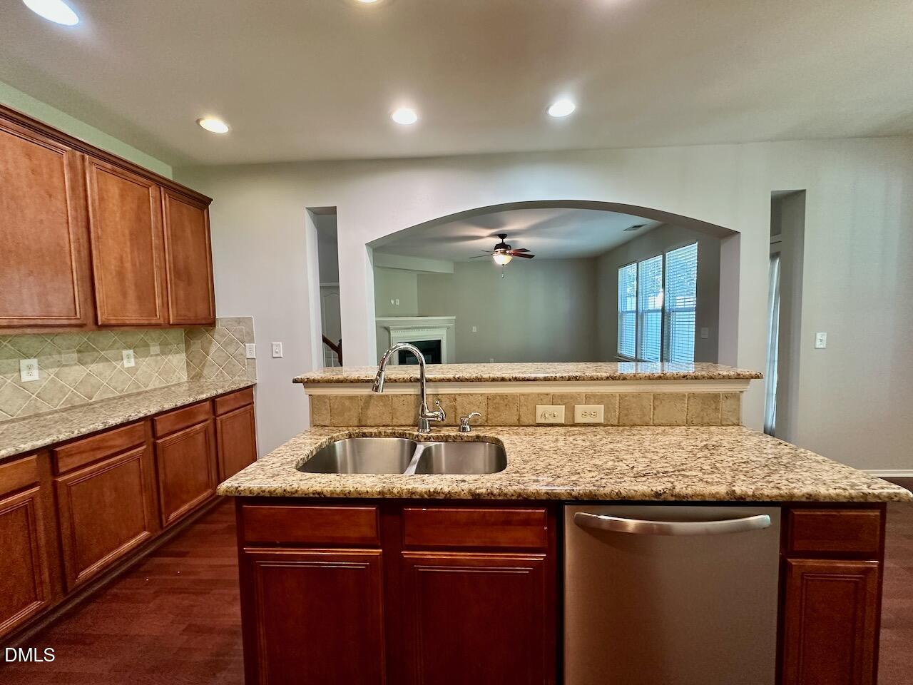 8208 Stone Cellar Drive Raleigh, NC 27613 - Photo 13 of 34 a kitchen with a sink and cabinets