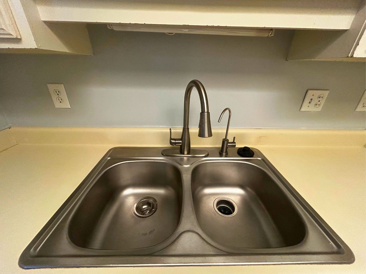 8210 Bent Tree Road, Unit 247 Austin, TX 78759 - Photo 8 of 21 a close view of sink and tap