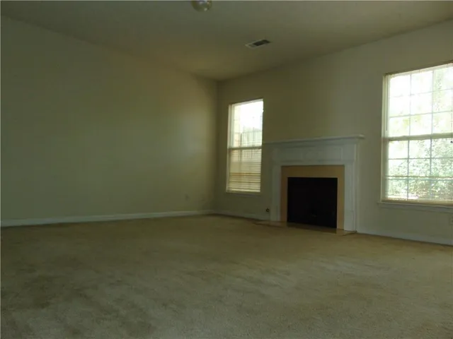 a bathroom with a toilet and a sink