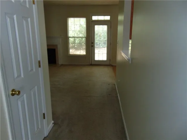 an empty room with windows