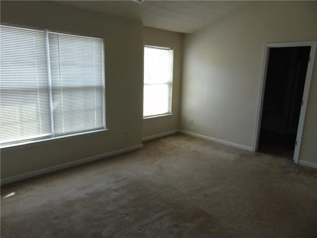 a view of hallway with closet