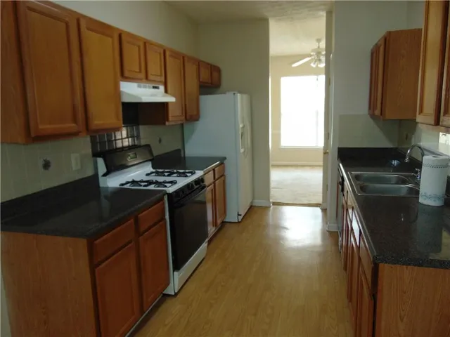 an empty room with a fireplace