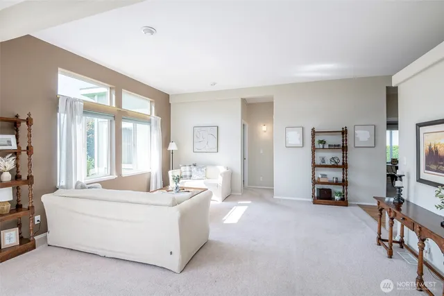a view of a hallway view with wooden floor and staircase