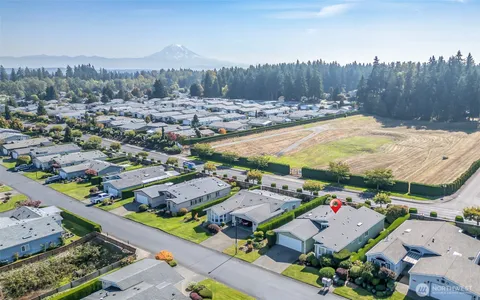 a view of an outdoor space and basketball court