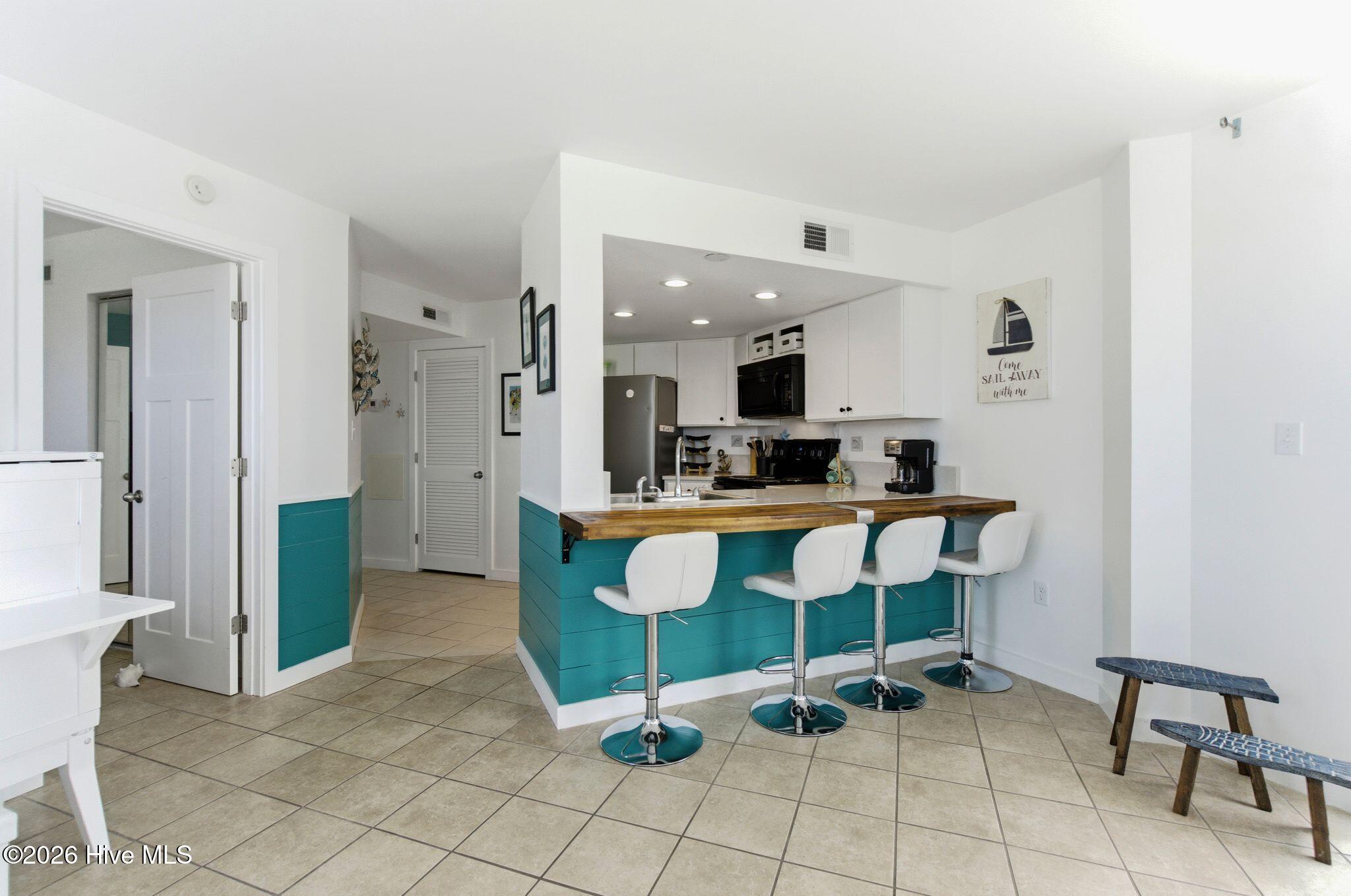 2000 New River Inlet Road, Unit 3201 North Topsail Beach, NC 28460 - Photo 13 of 65 Space for a table