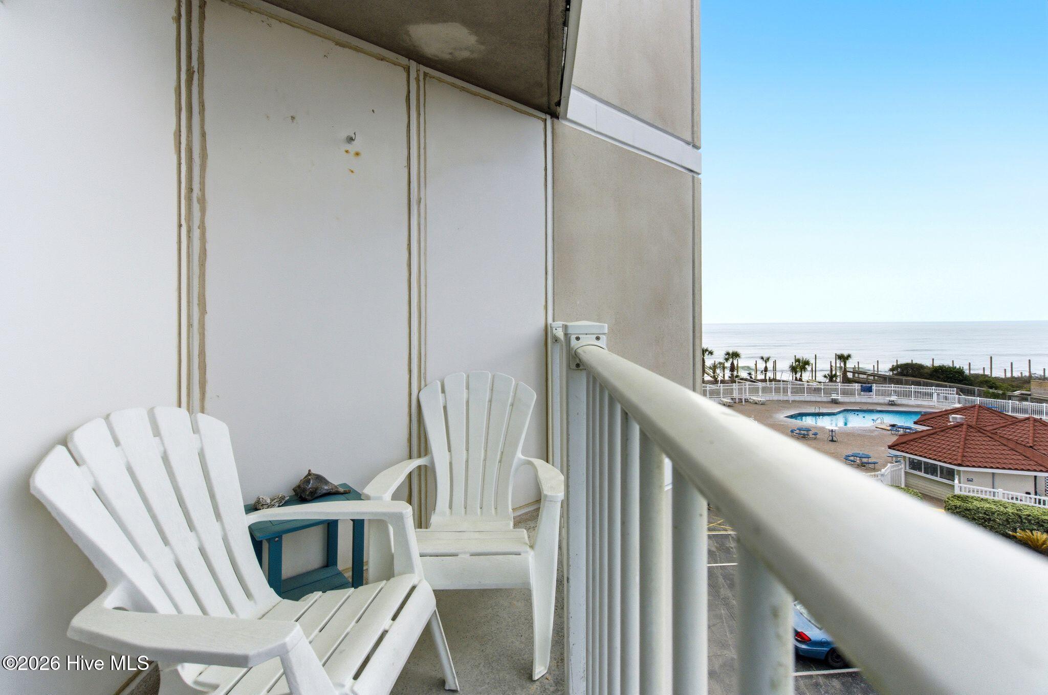 2000 New River Inlet Road, Unit 3201 North Topsail Beach, NC 28460 - Photo 27 of 65 Balcony looking towards Pool area and Ocean
