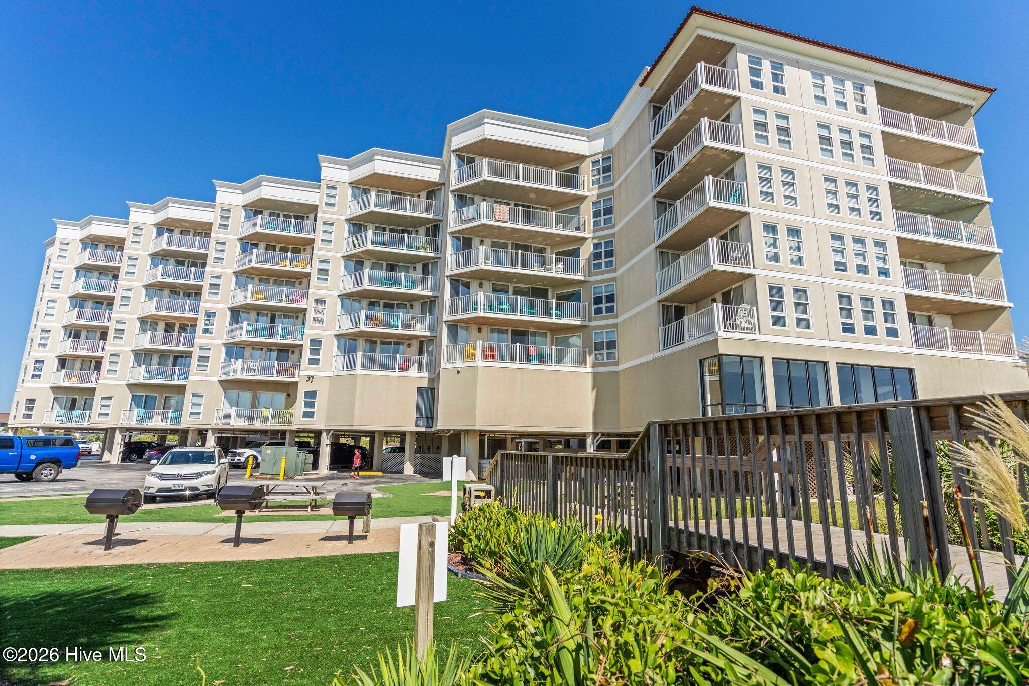 2000 New River Inlet Road, Unit 3201 North Topsail Beach, NC 28460 - Photo 53 of 65 Grilling area and walk way to Ocean