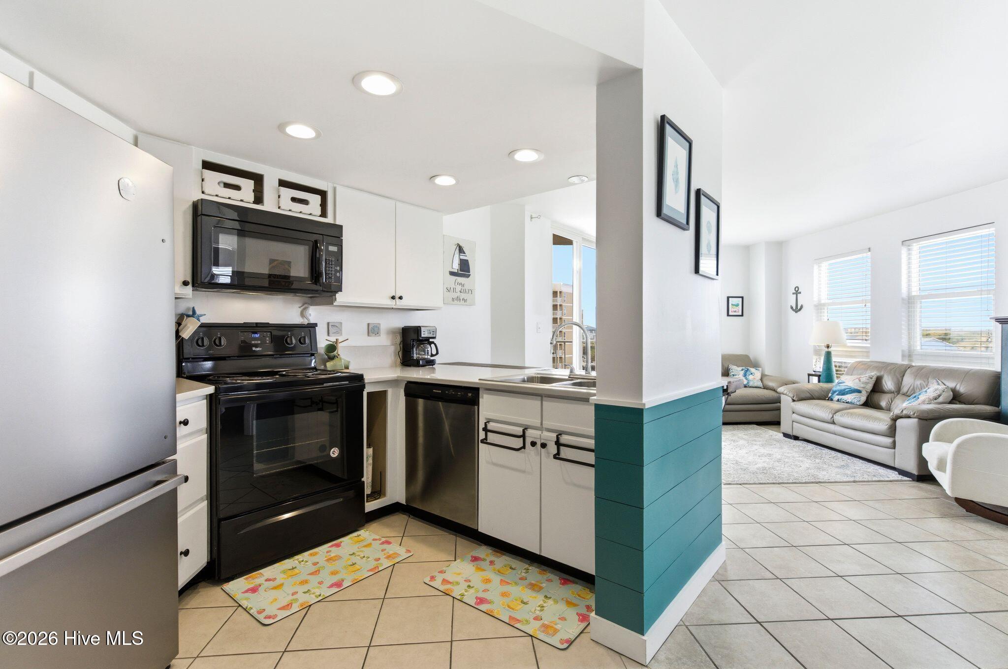 2000 New River Inlet Road, Unit 3201 North Topsail Beach, NC 28460 - Photo 9 of 65 Refrigerator - 2024