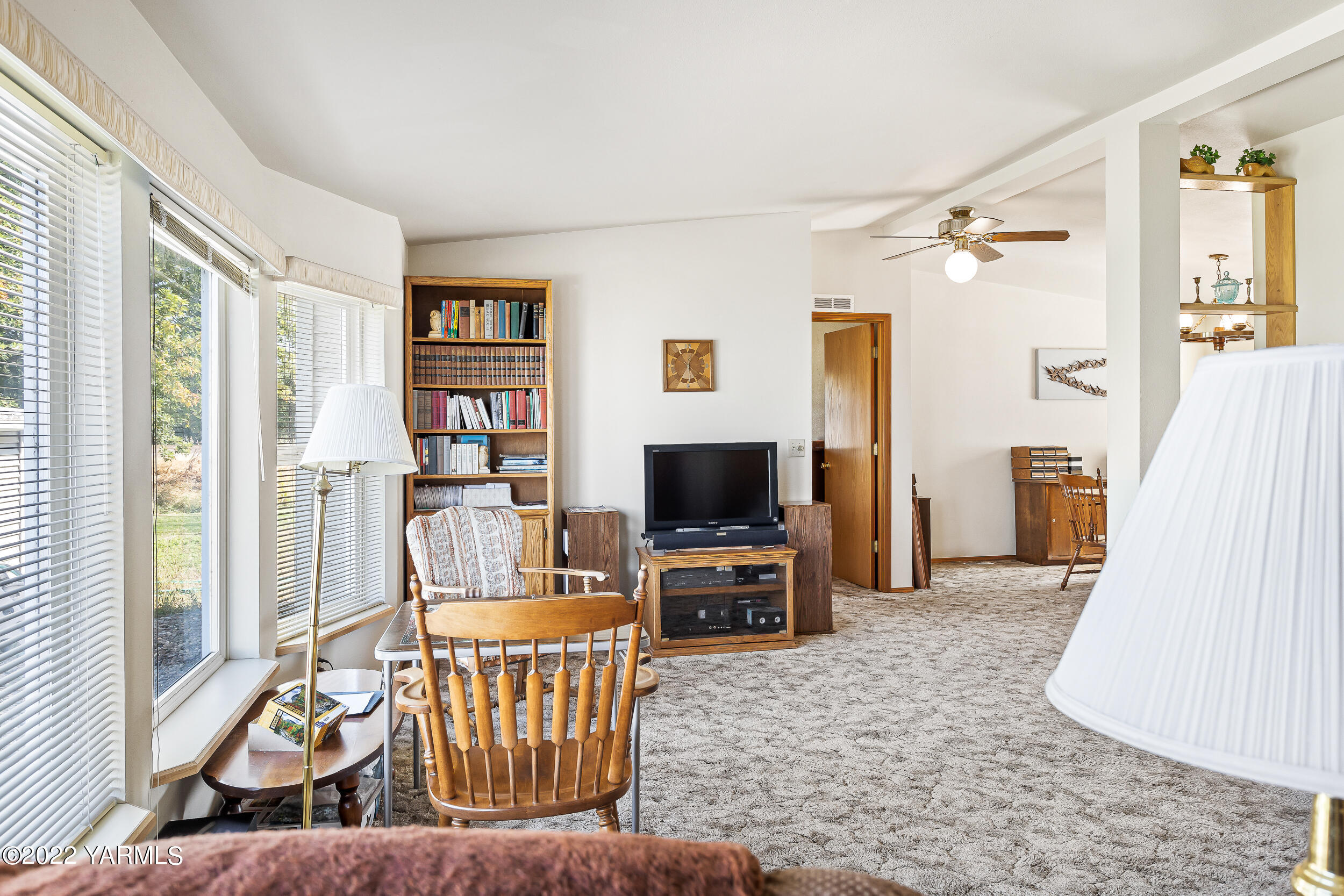1607 Beaudry Road Yakima, WA 98901 - Photo 5 of 45 a living room with furniture and a flat screen tv