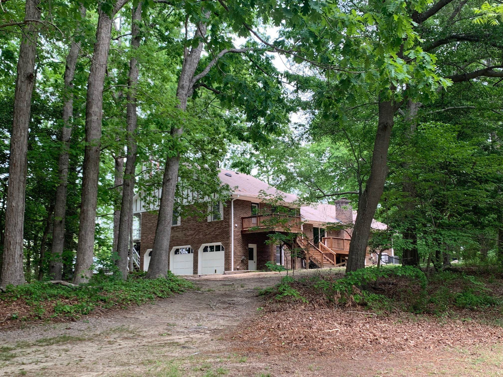 3024 Old Crews Road Raleigh, NC 27616 - Photo 8 of 13 a front view of a house with a garden