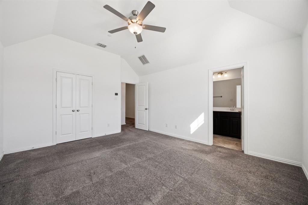 964 Emil Place Allen, TX 75013 - Photo 18 of 25 an empty room with a ceiling fan and a ceiling fan