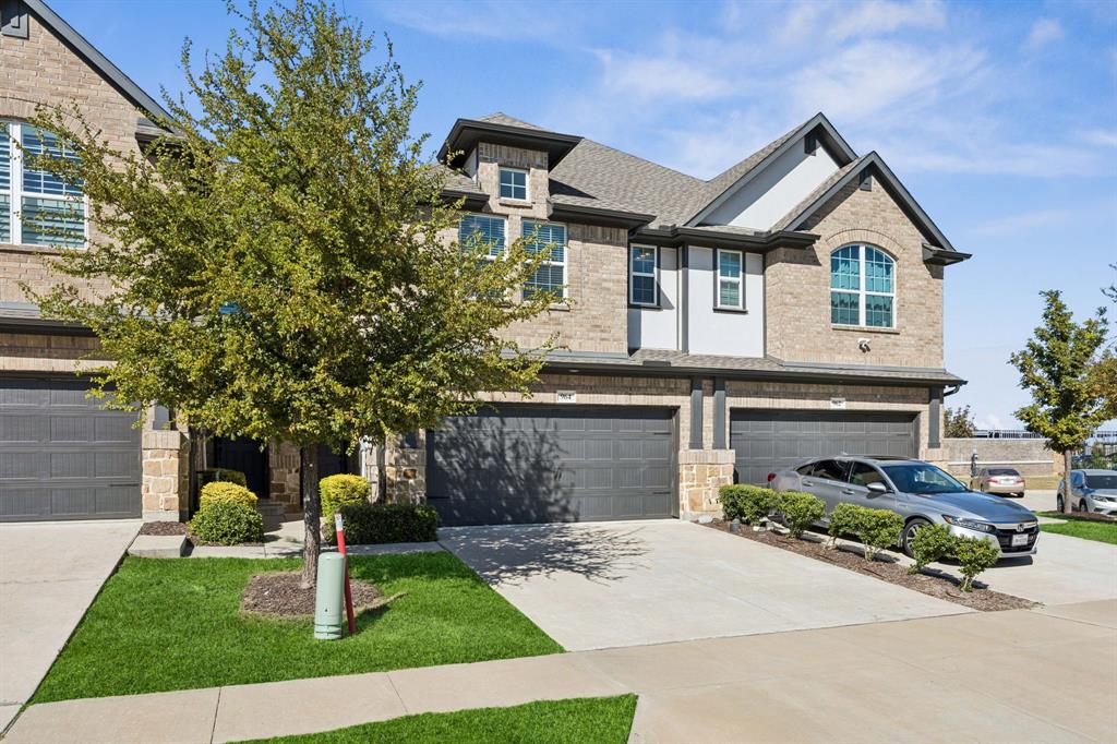 964 Emil Place Allen, TX 75013 - Photo 3 of 25 a front view of a house with a yard and garage