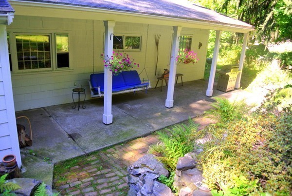 127 Beaman Road Sterling, MA 01564 - Photo 5 of 29 a view of a house with a backyard