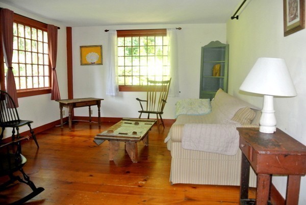 127 Beaman Road Sterling, MA 01564 - Photo 8 of 29 a living room with furniture and a window