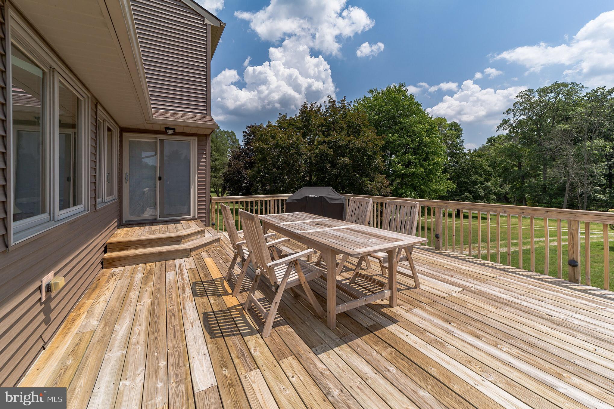 1839 Eagle Farms Road Chester Springs, PA 19425 - Photo 27 of 35 Deck View toward Anderson gliding doors to kitchen