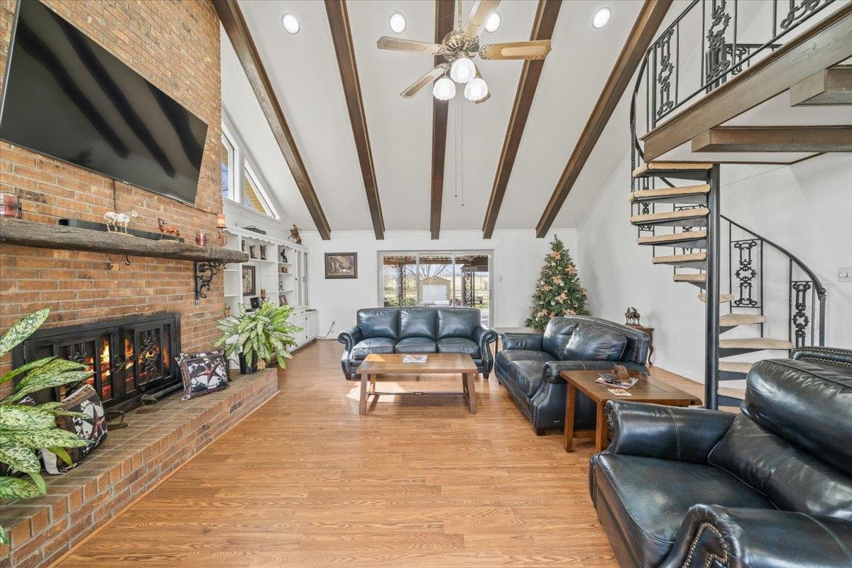 2051 Solo Road Covington, TN 38019 - Photo 9 of 36 a living room with furniture and a fireplace