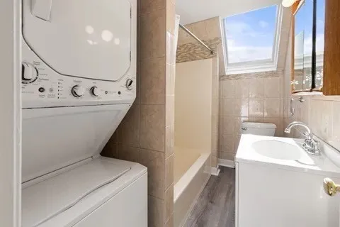 a utility room with dryer and washer