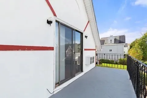 a view of swimming pool with outdoor seating