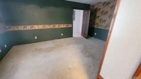 a kitchen with a refrigerator a sink and dishwasher