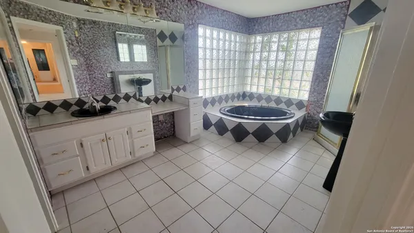a view of a livingroom with furniture and window