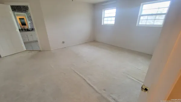 a view of entryway with wooden walls