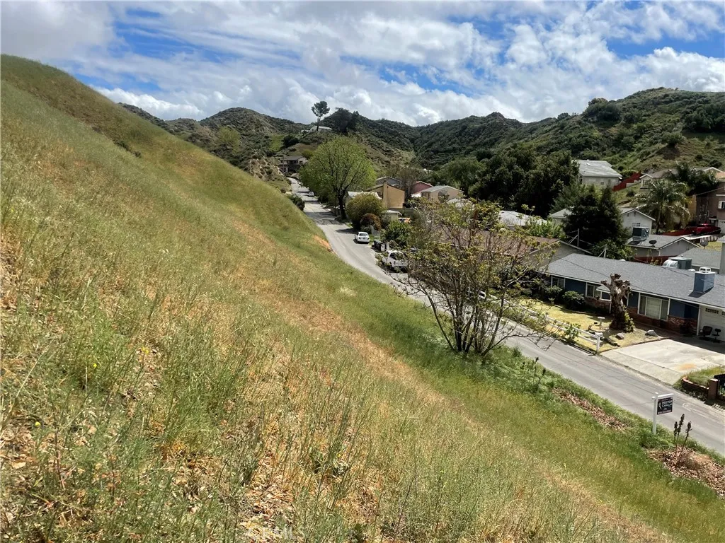 14 Driver Val Verde, CA 91384 - Photo 2 of 14 a view of residential houses with outdoor space