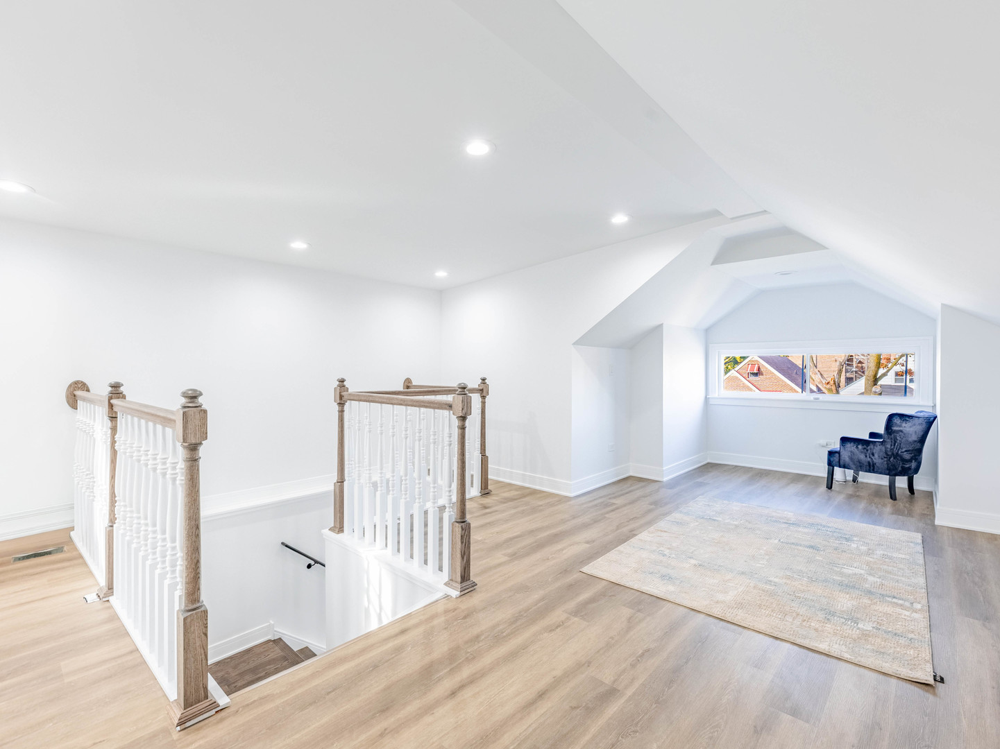 7755 South Wolcott Avenue Chicago, IL 60620 - Photo 20 of 39 a view of a hallway view with staircase