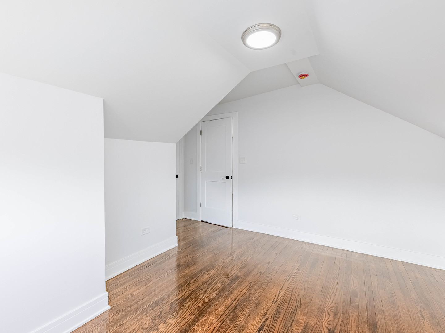 7755 South Wolcott Avenue Chicago, IL 60620 - Photo 23 of 39 a view of an empty room with wooden floor
