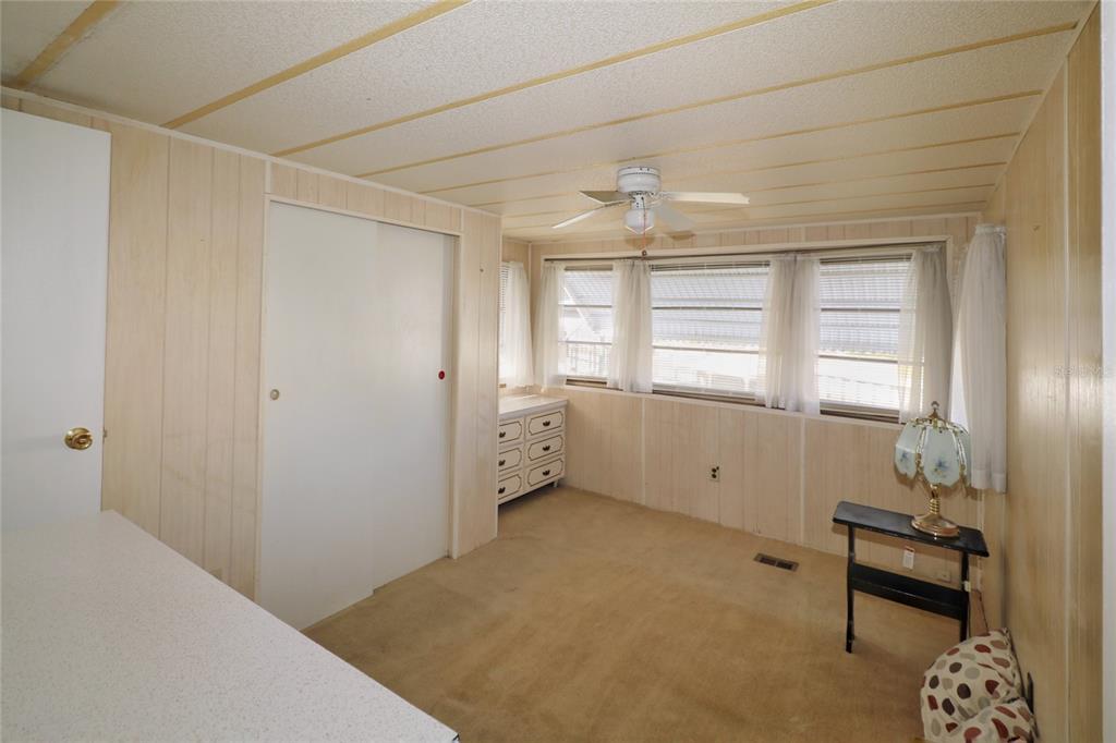 116 West St Johns Way Apollo Beach, FL 33572 - Photo 13 of 28 a view of an empty room with a window