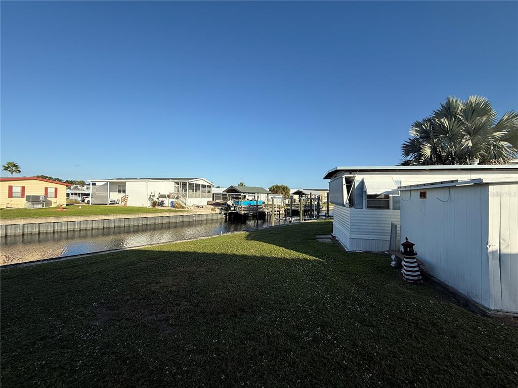116 West St Johns Way Apollo Beach, FL 33572 - Photo 4 of 28 a view of a patio near a yard