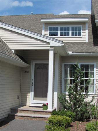 705 Autumn Ridge Drive, Unit 705 Ayer, MA 01432 - Photo 1 of 16 a house view with a outdoor space