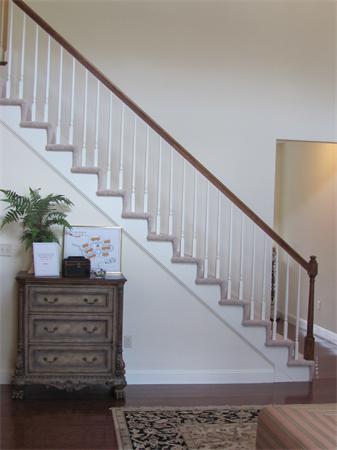 705 Autumn Ridge Drive, Unit 705 Ayer, MA 01432 - Photo 5 of 16 a view of entryway and hall with wooden floor