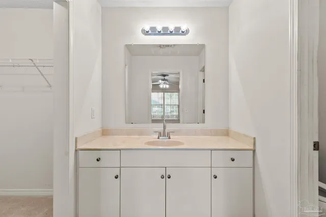 a sink with a mirror