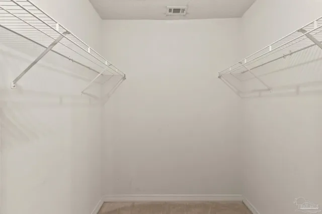 a view of small space with racks on the wall