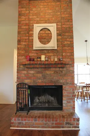 a fireplace with a rug