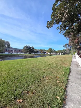 a view of a golf course with a lake