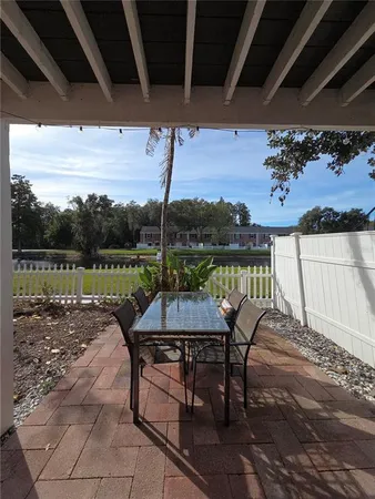 a view of a chairs and table on the terrace