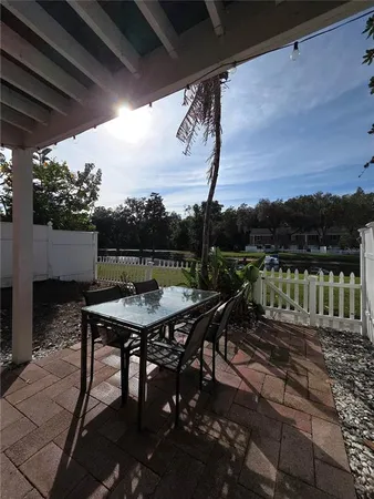 a view of a chairs and table on the terrace