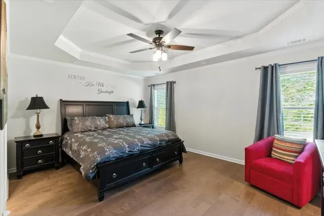 a bathroom with double vanity sink and a mirror