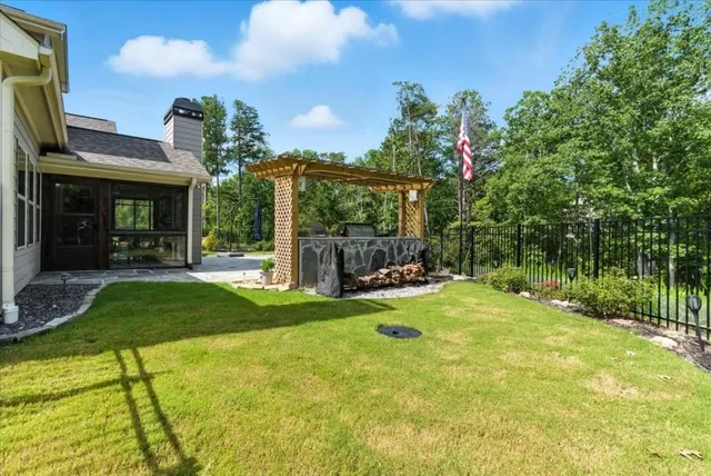 a view of a lake from a yard