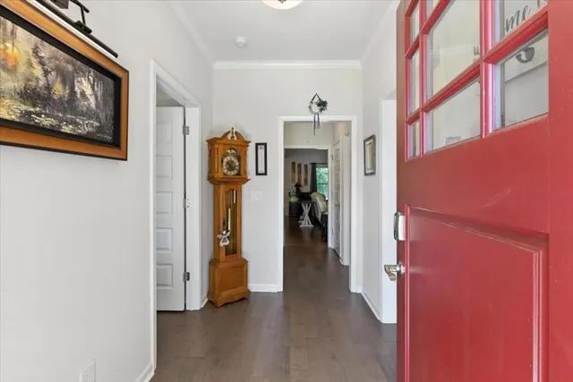 a living room with fireplace furniture and a flat screen tv